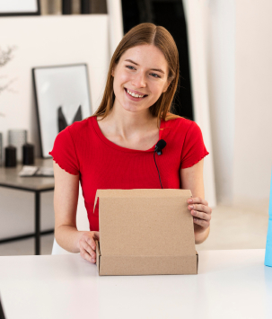 Woman holding opened box